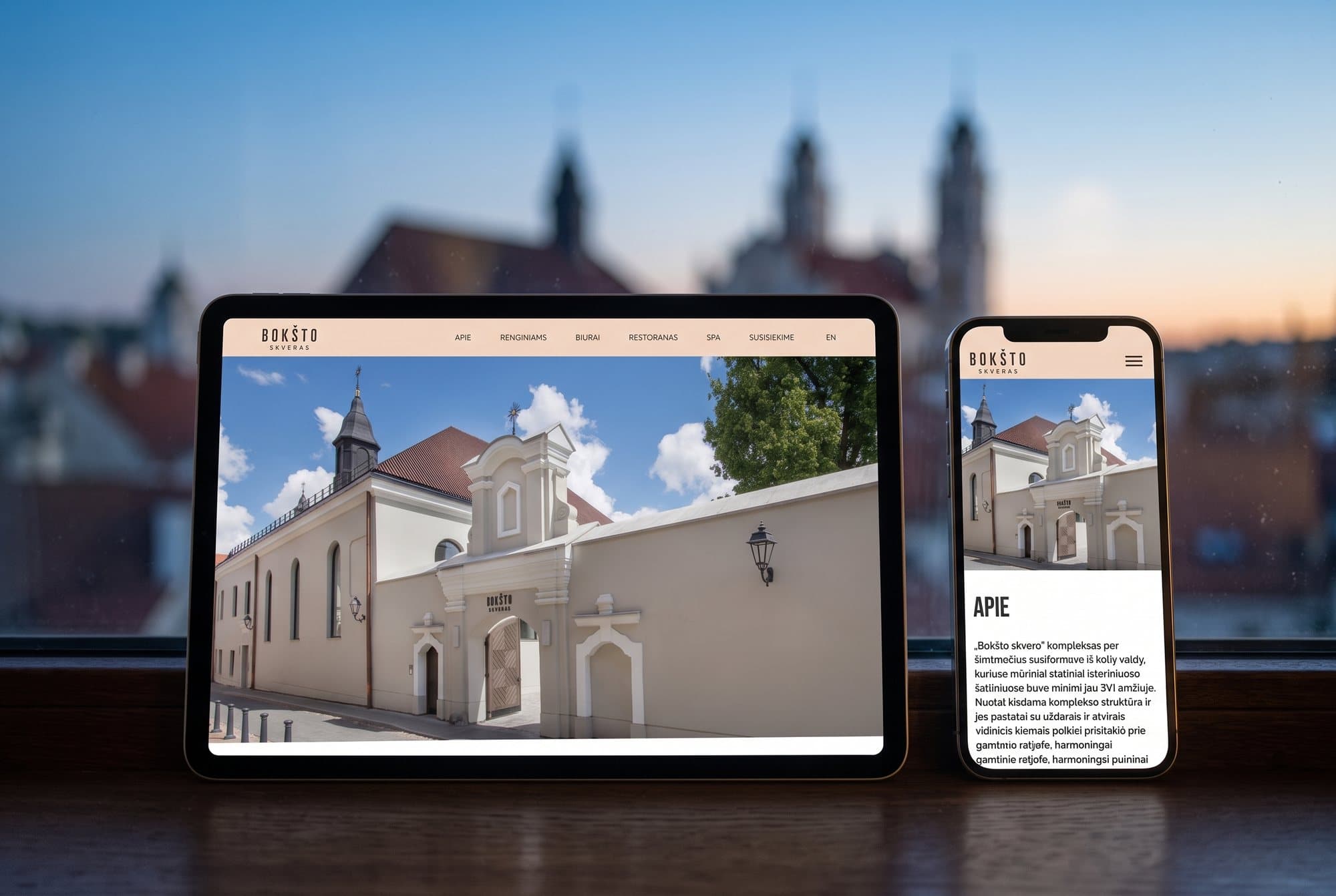 The Bokšto skveras website on a tablet and a phone